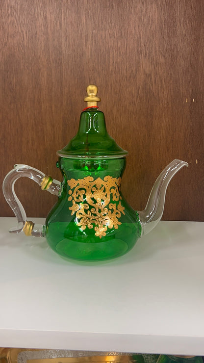 Théière en verre élégante avec motif floral doré