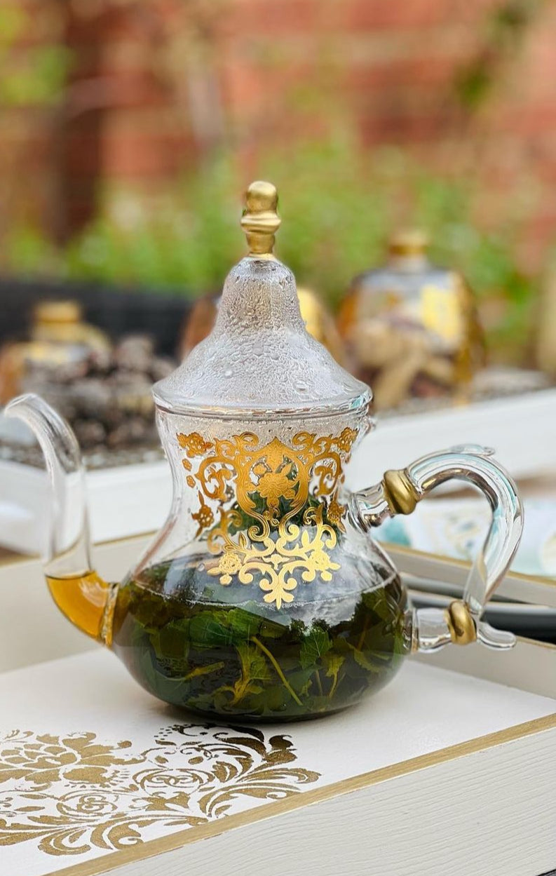 Elegant Glass Teapot with Golden Floral Design